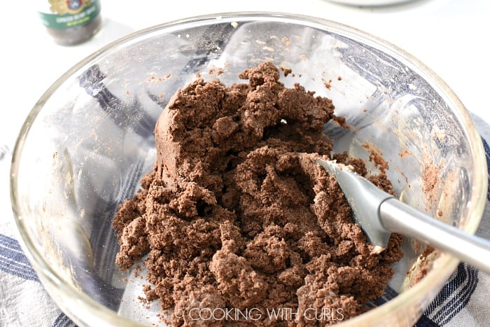 Cocoa, flour and other dry ingredients mixed into the cookie dough cookingwithcurls.com