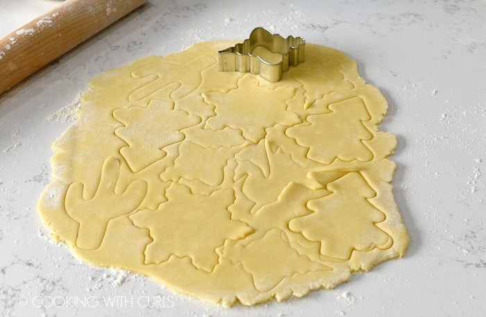 Shapes cut-out of the dough with cookie cutters.