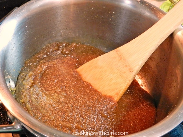 Brown sugar stirred into melted butter with a wooden spoon. 