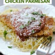 Crispy panko crusted chicken parmesan on a bed of angel hair pasta and topped with marinara sauce and grated parmesan and title graphic across the top.