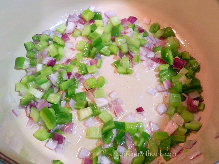 Diced green pepper, celery and onions in a large pot.
