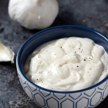 This Super Easy Garlic Aioli is ready in minutes and adds a whole new level of flavor to sandwiches and burgers | cookingwithcurls.com