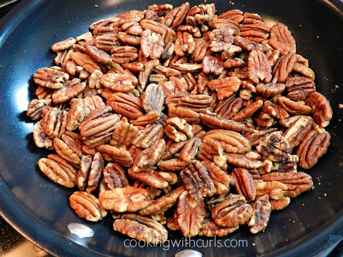 Toast Pecans in a non-stick skillet. 