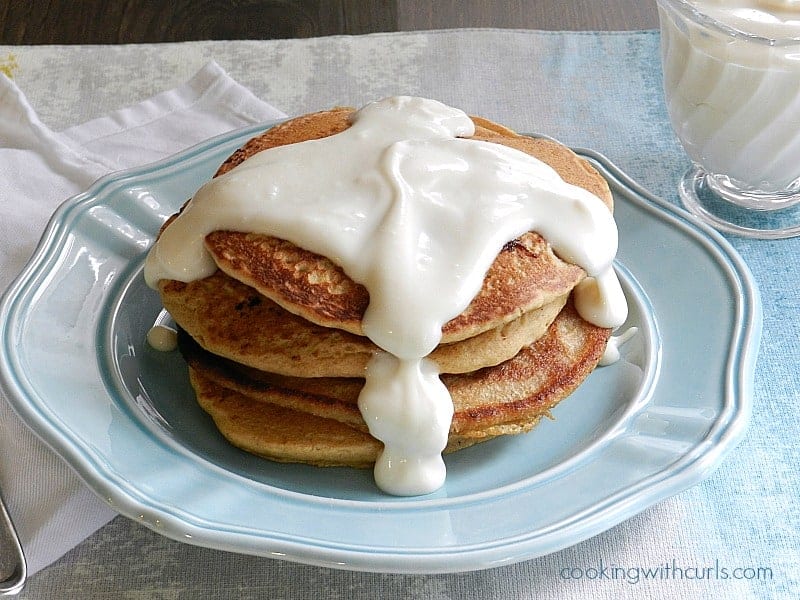 Whole Wheat Cinnamon Roll Pancakes with Cream Cheese Syrup cookingwithcurls.com