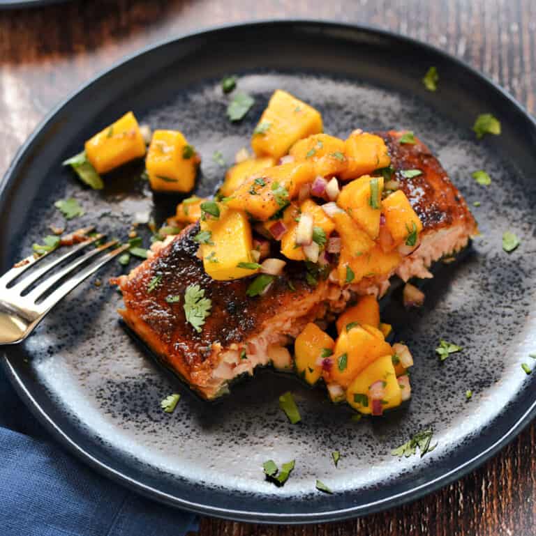 Spice Rubbed Salmon Cooking with Curls