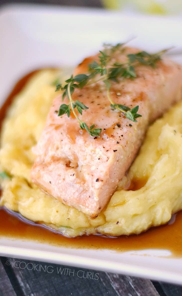 Guinness Glazed Salmon with perfect mashed potatoes is a quick weeknight meal that the whole family will enjoy! cookingwithcurls.com