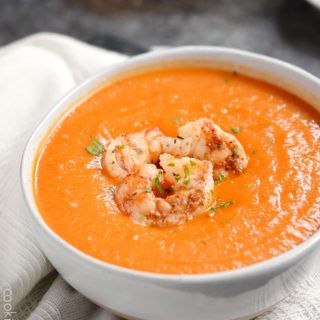 This Roasted Red Pepper Soup with Grilled Shrimp is creamy and delicious with a sweet and tangy flavor | cookingwithcurls.com