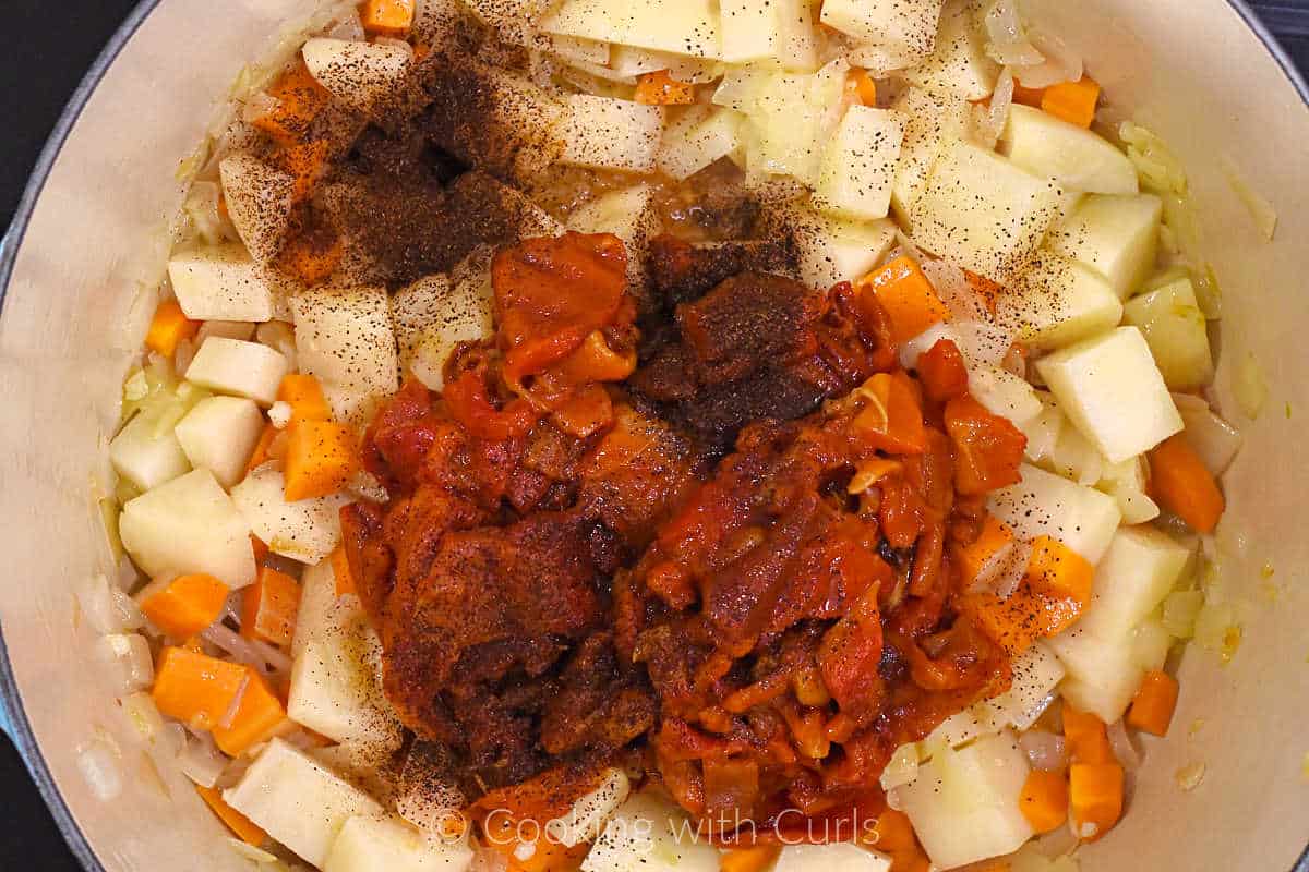 roasted-red-pepper-onion-potato-carrots-chili-powder-in-large-pot.