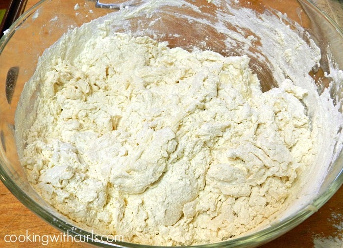 Stir flour into the sourdough starter in a large glass bowl