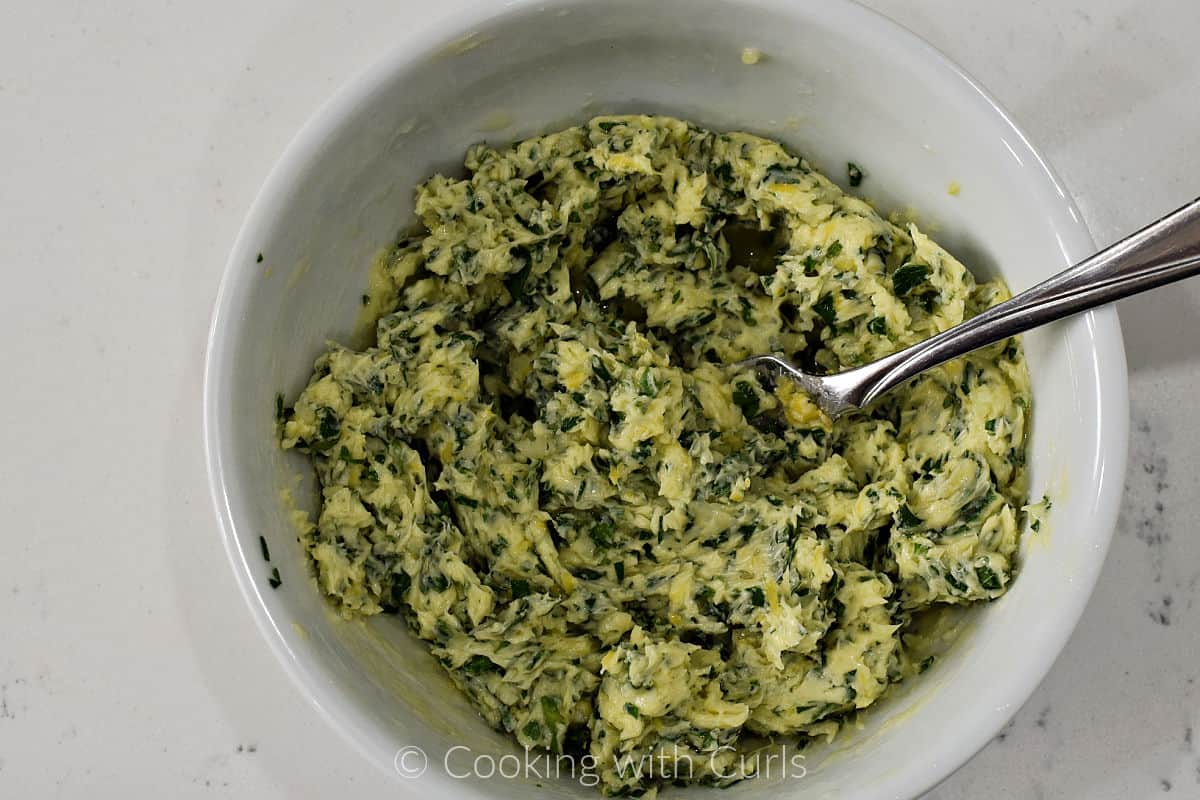 Garlic Lemon Herb Butter mixed together in a small bowl. 
