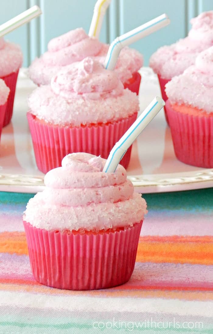 Watermelon Margarita Cocktail Cakes topped with watermelon margarita buttercream!! cookingwithcurls.com