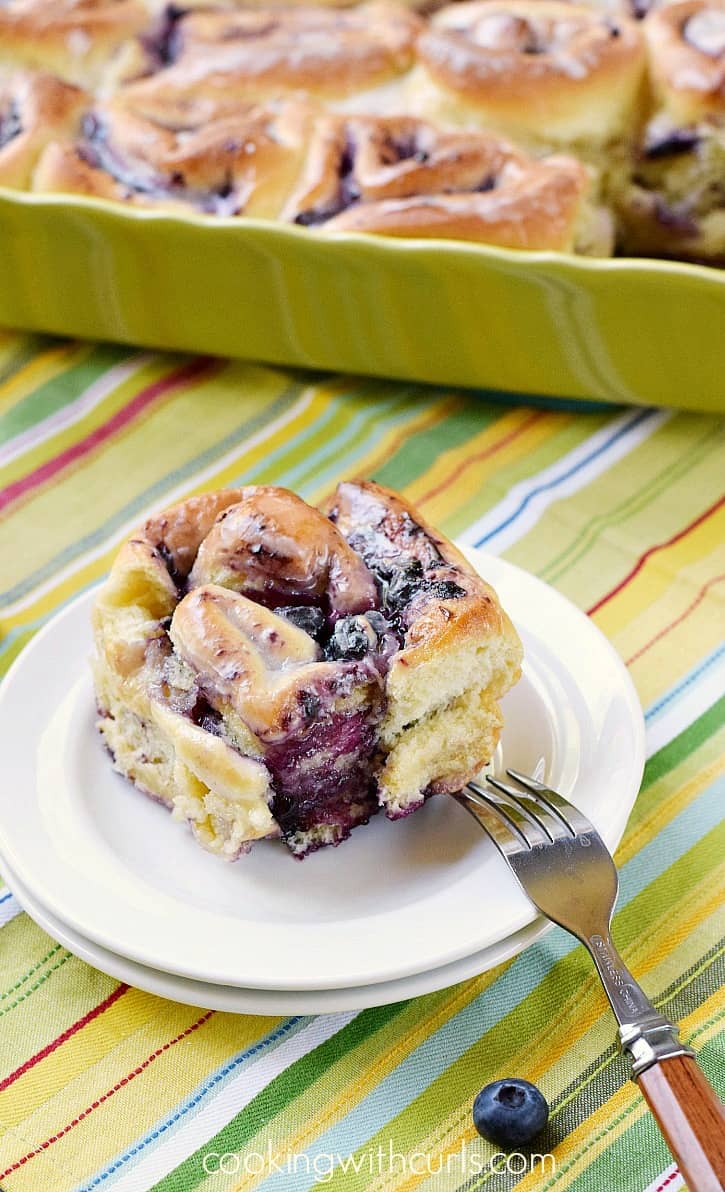 Blueberry Sweet Rolls with Lemon Glaze are the perfect way to start the day! cookingwithcurls.com