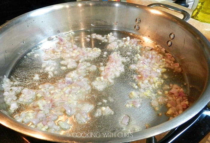 Shallots, garlic and oil in a large frying pan. 