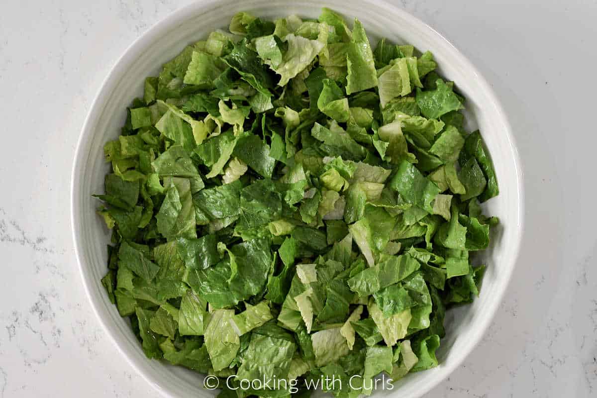 Chopped romaine lettuce in a salad bowl.