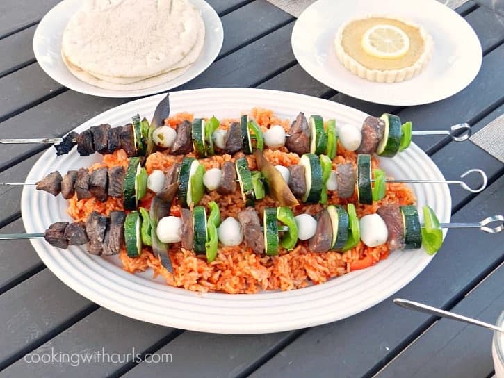 Greek marinated Lamb and Vegetable Kabobs, grilled to perfection with green peppers, zucchini, and pearl onions - cookingwithcurls.com