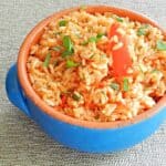 This Greek version of Tomato Pilaf is the perfect side dish for my Lamb and Vegetable Kabobs! cookingwithcurls.com