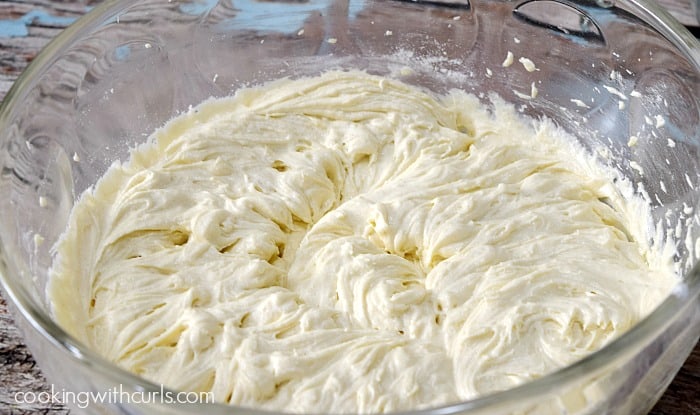 Muffin batter in a large glass bowl.