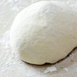 Homemade Pizza Dough made super easy with a bread machine or stand mixer | cookingwithcurls.com