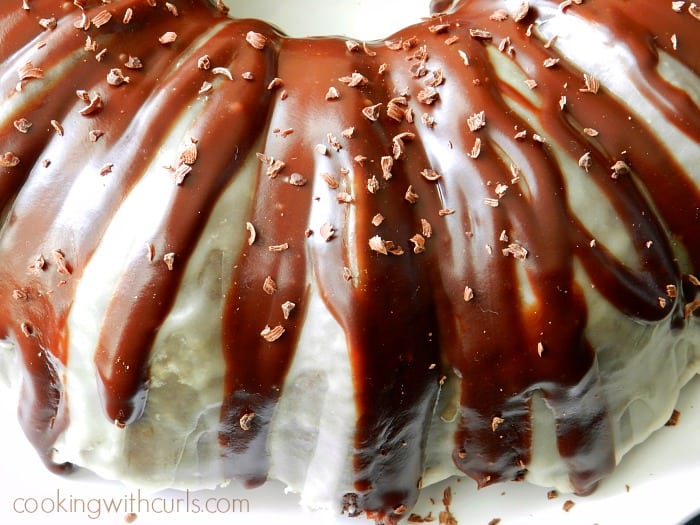 Peppermint Mocha Cocktail Cake topped with a thick chocolate ganache cookingwithcurls.com