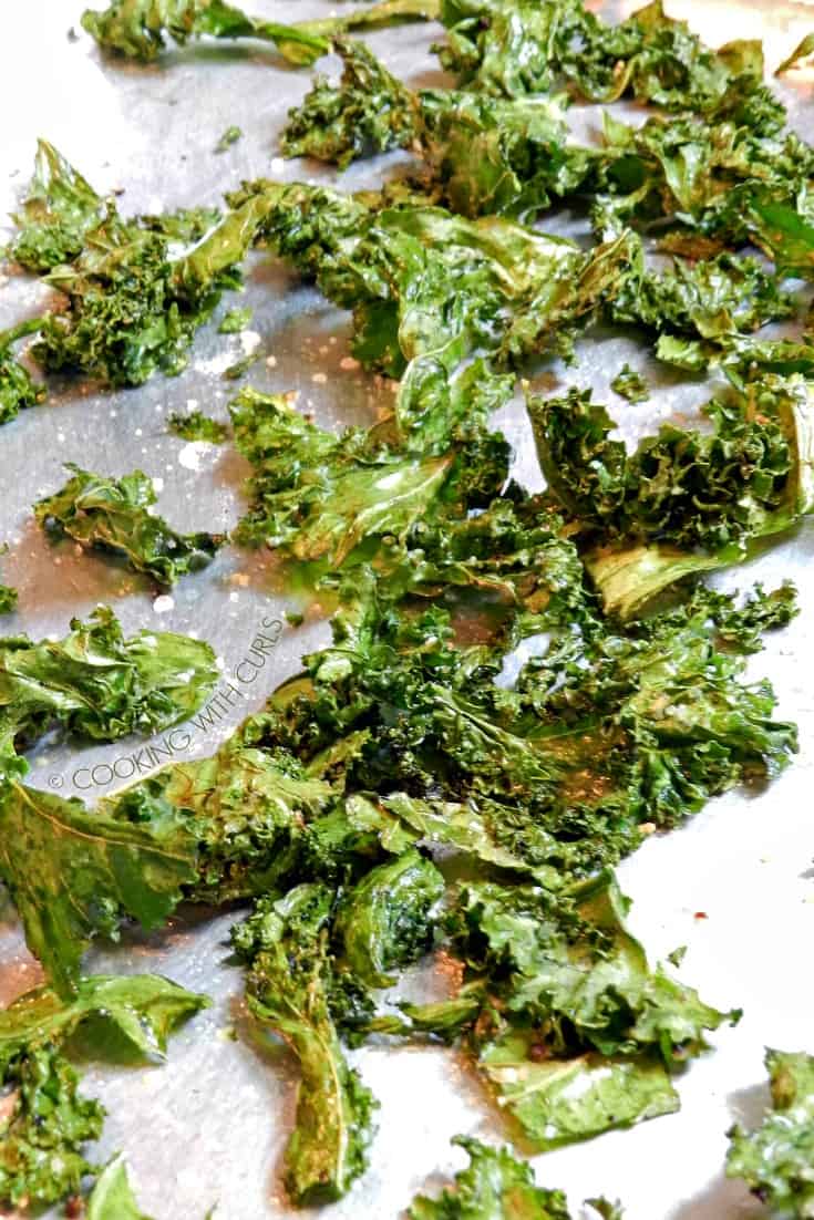 Kale Chips baked and seasoned with garlic, pepper and sea salt. 