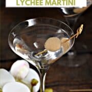 Two lychee martinis in martini glasses garnished with a lychee skewered with a bamboo cocktail stick with title graphic across the top.