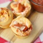These light and fluffy Pepperoni Pizza Muffins are super easy to make and everyone loves them! cookingwithcurls.com