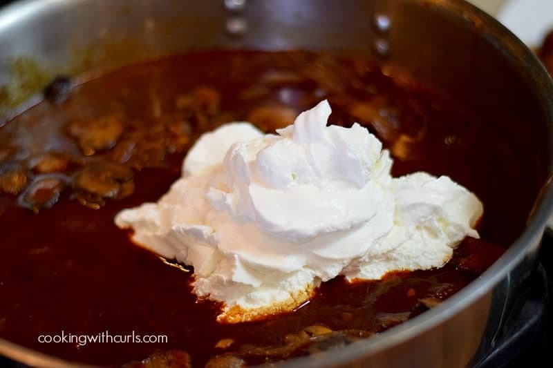 sour cream added to the remaining sauce in the stainless steel skillet