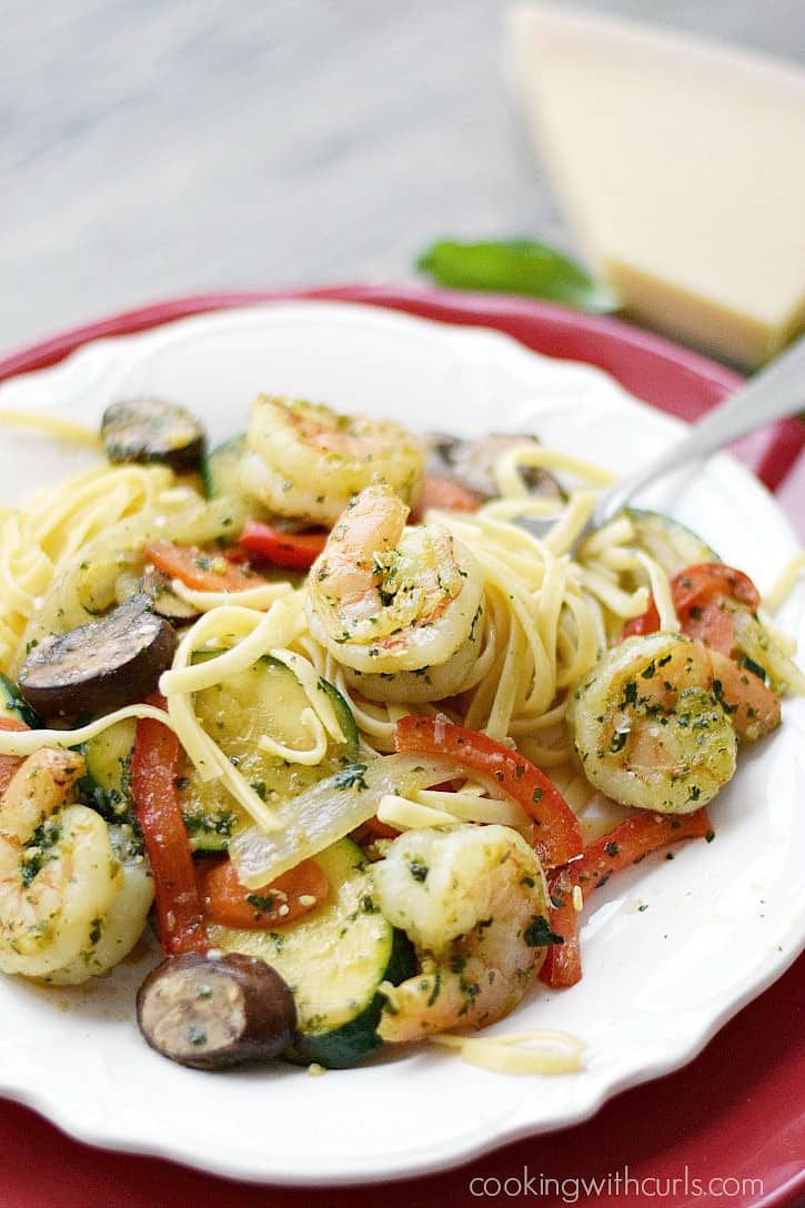 Shrimp Pesto with Pasta is loaded with vegetables and flavor for an easy weeknight meal! cookingwithcurls.com