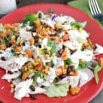 Southwest Chicken Salad for Fall topped with roasted sweet potato and corn salsa, and a chipotle ranch dressing