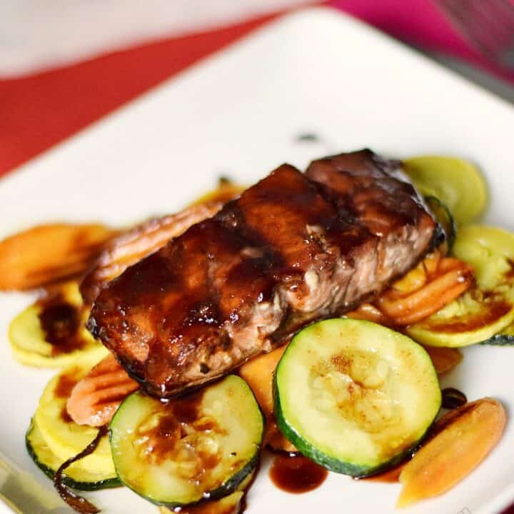 Cherry Chipotle Glazed Salmon Cooking with Curls