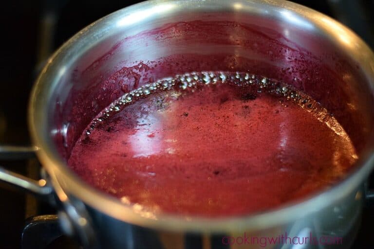 Cherry Chipotle Glazed Salmon Cooking with Curls