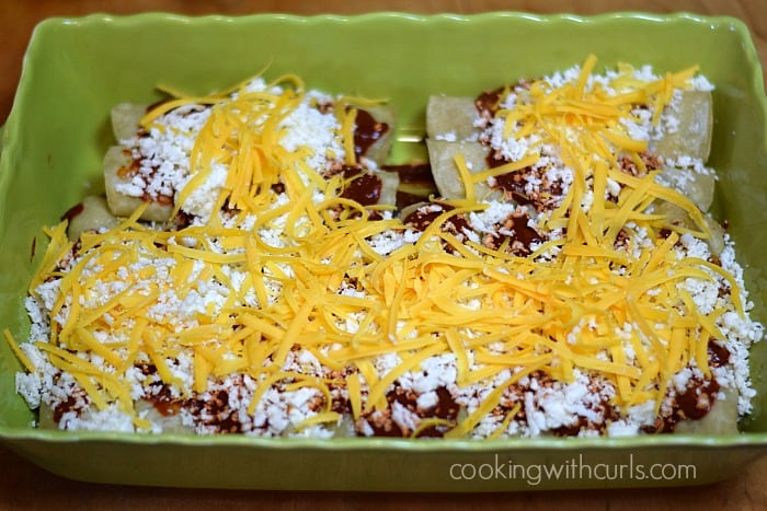 Shredded Beef Enchiladas top cheese cookingwithcurls.com