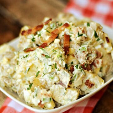 Bacon potato salad in a serving bowl.