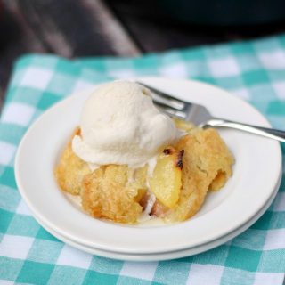 An Old-Fashioned Peach Cobbler topped with ice cream | cookingwithcurls.com