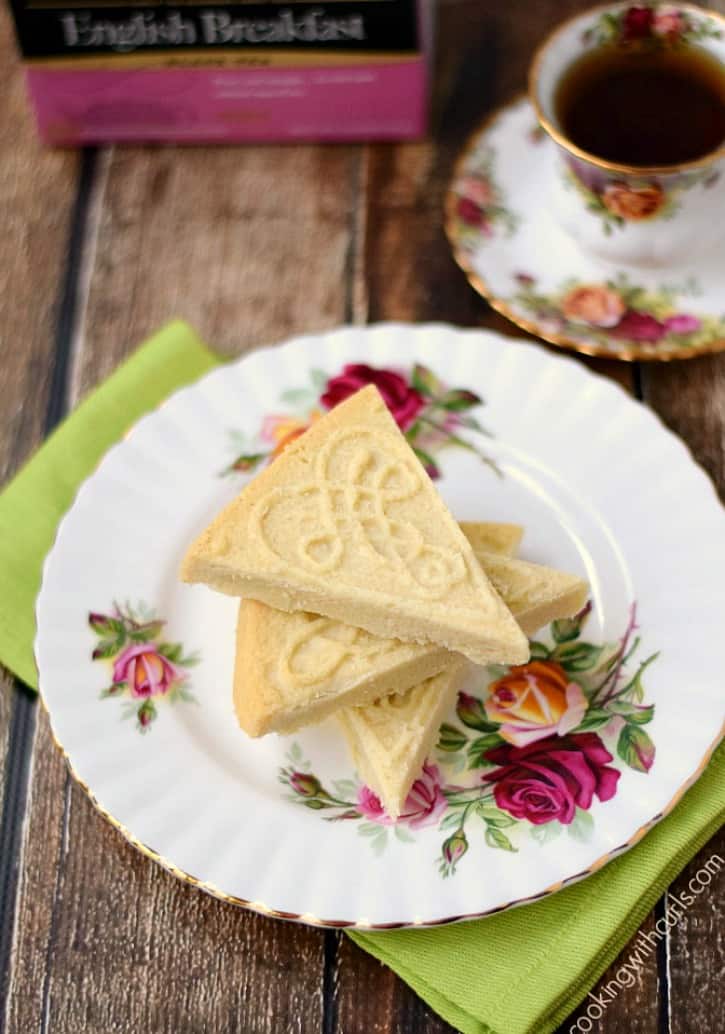 Traditional Shortbread on a rose decorated plate beside a cup of tea