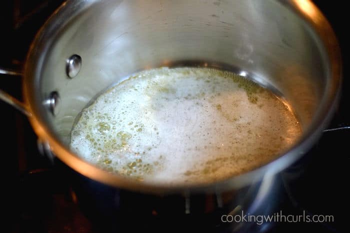 melted butter simmering in a saucepan.