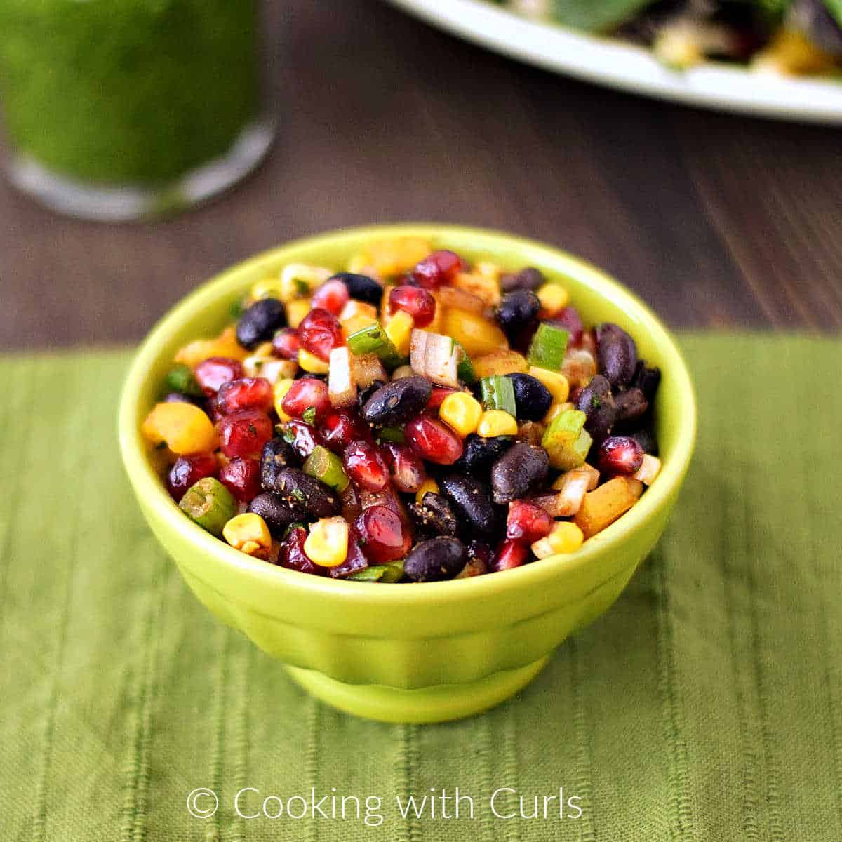 Black bean and corn salsa with pomegranate seeds.