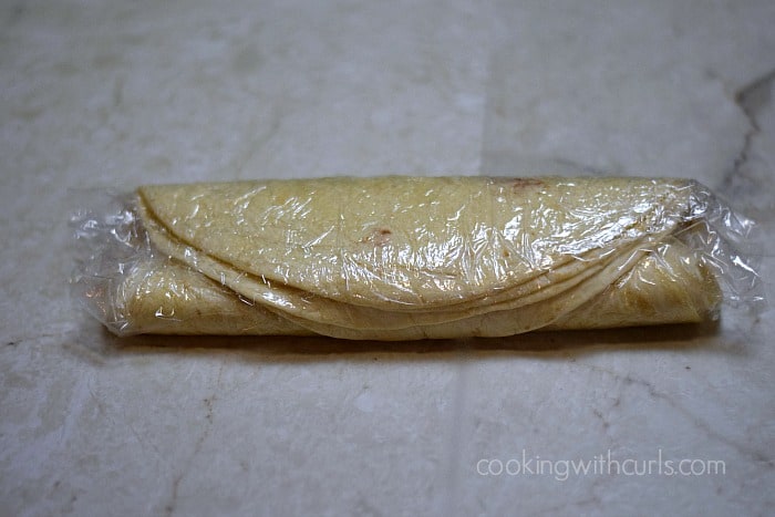 Flour tortillas wrapped in plastic wrap.