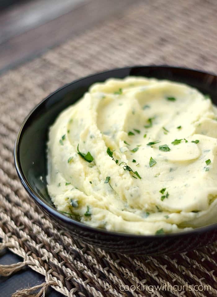 These Goat Cheese Whipped Potatoes are fluffy and delicious! cookingwithcurls.com