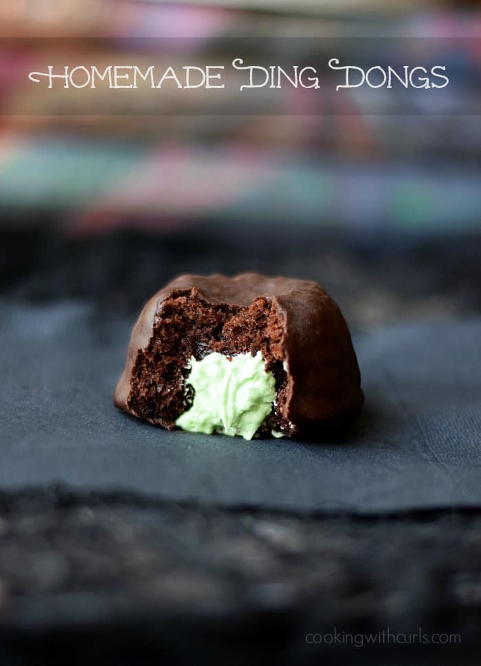 A chocolate covered mini chocolate bundt cake with a creamy green filling.