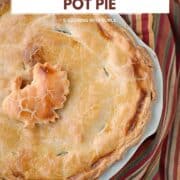 Looking down on a whole turkey pot pie in a pie pan with a cut-out turkey decoration in the center with title graphic across the top.