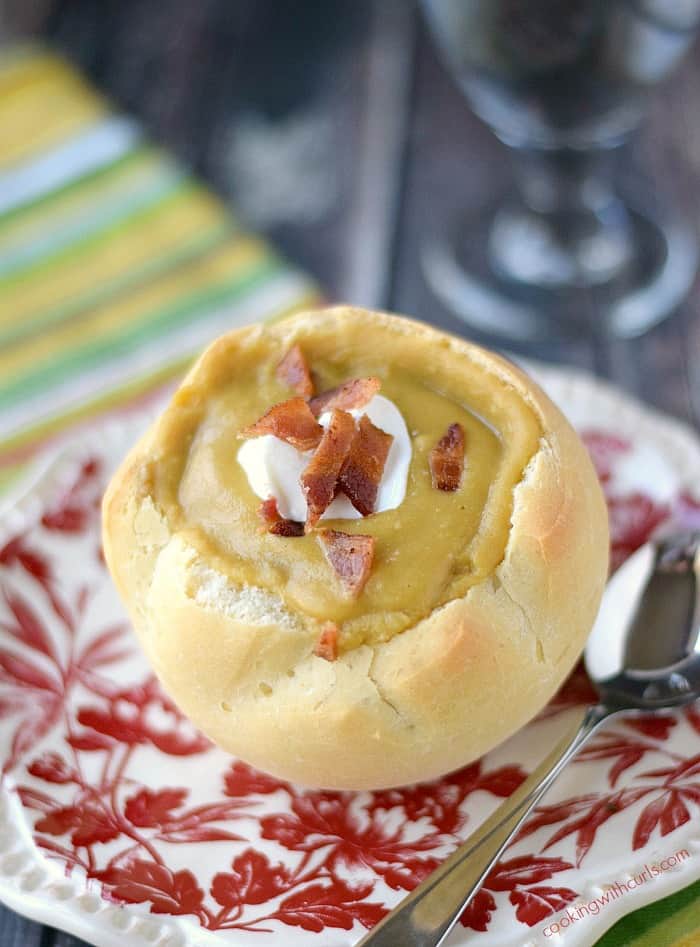 Homemade Split Pea Soup served in a bread bowl topped with Greek yogurt and crumbled bacon, Yum!! cookingwithcurls.com