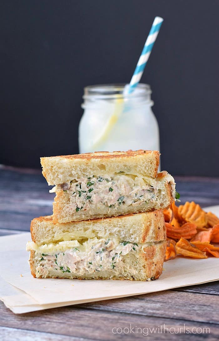 Wild-caught tuna, fresh lemon zest and juice are mixed with mayonnaise, tarragon, and Dijon mustard then topped with melted cheese and grilled sourdough for a mouth watering Gourmet Tuna Melt! cookingwithcurls.com