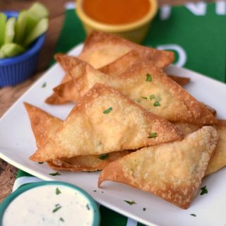 A spicy twist on my favorite appetizer, makes these Buffalo Chicken Rangoons perfect for game day! cookingwithcurls.com