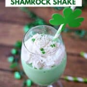 A whipped cream topped green shamrock shake with shamrock sprinkles and title graphic across the top.