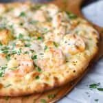Shrimp Scampi Pizza topped with a light garlic-lemon sauce and mozzarella cheese cookingwithcurls.com_