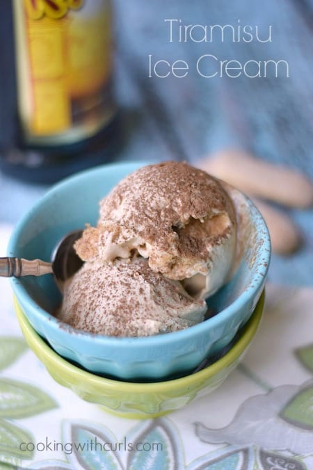 Two scoops of Tiramisu Ice Cream sprinkled with cocoa powder.