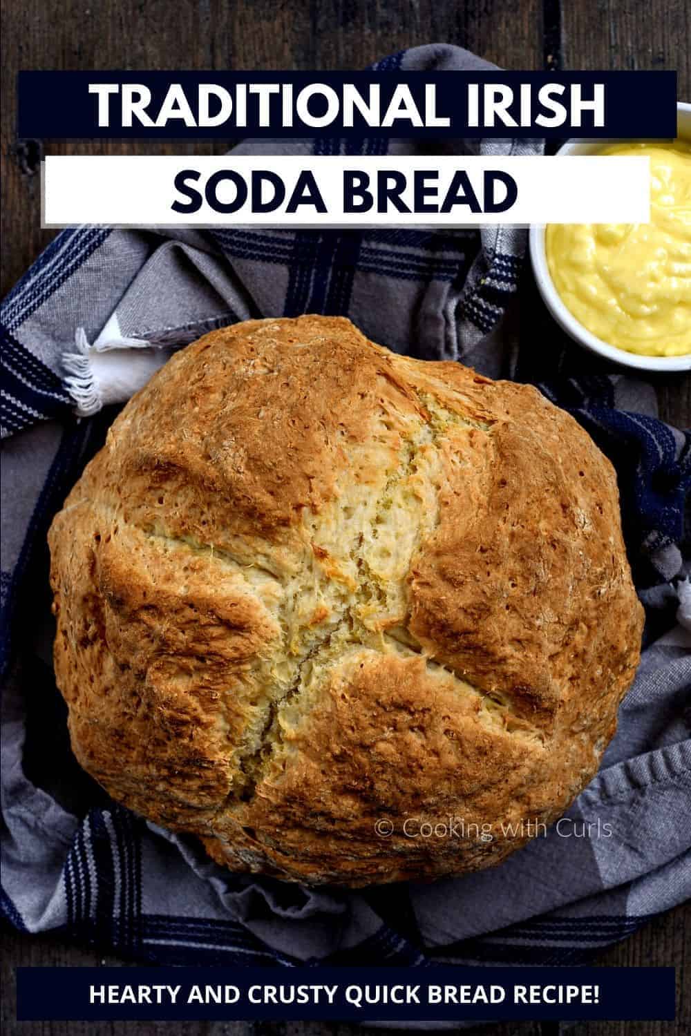Looking down on a loaf of Traditional Irish Soda Bread with a bowl of butter on the side and title graphic across the top.