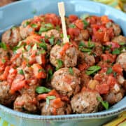 Meatballs with tomato sauce in a serving bowl.