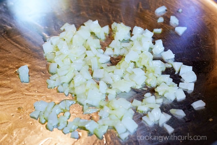 Diced onions and oil in a skillet.